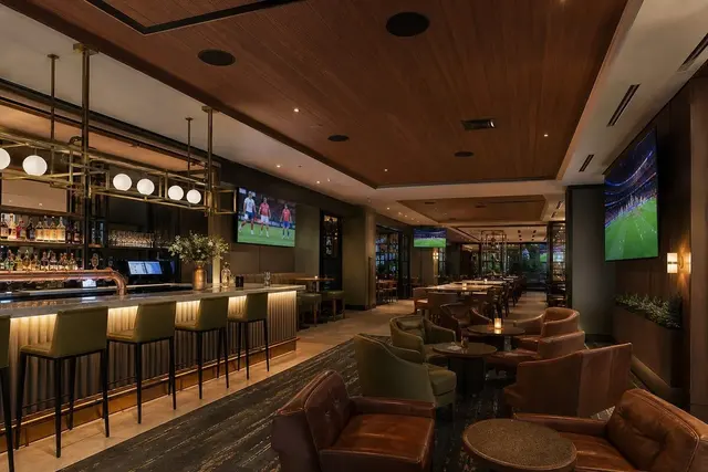 Modern club and pub interior with commercial audio and TV systems